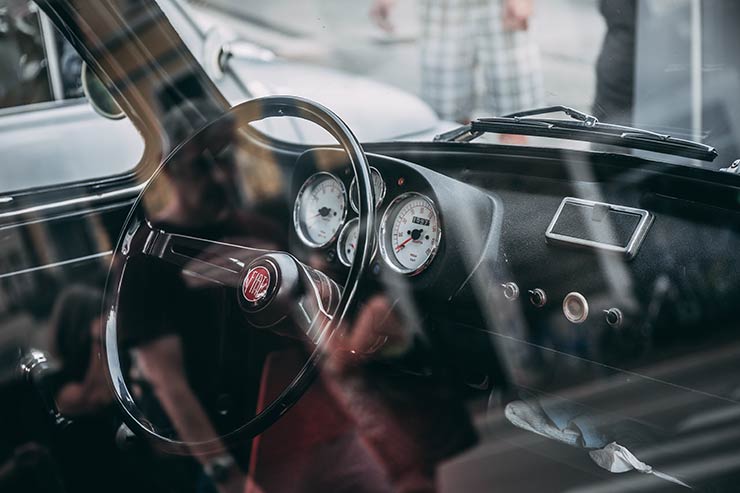 Professional auto repair shop with vehicle lift and diagnostic equipment